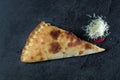 A piece of fresh cheese pie on a gray stone background Royalty Free Stock Photo