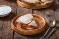 Piece of fresh rhubarb and strawberry pie with cream nearby Royalty Free Stock Photo