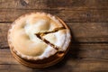 Piece of fresh rhubarb and strawberry pie with cream nearby Royalty Free Stock Photo