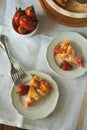 Piece of fresh strawberry and rhubarb pie on plate. Summer food eating. Top view Royalty Free Stock Photo