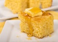 Cornbread with honey and butter Royalty Free Stock Photo