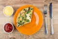 Piece of fried eggs with mushrooms and greens in plate Royalty Free Stock Photo