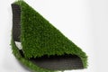 Piece grass for football. On a white background, close-up Royalty Free Stock Photo