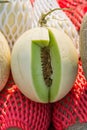 Piece of green cantaloupe cutted for test taste Royalty Free Stock Photo