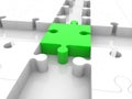 A piece of green puzzle in the center between the crossroads of a white puzzle Royalty Free Stock Photo