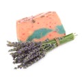 A piece of handmade soaps, and sprigs of lavender