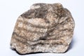 Piece of hard ground rock of Manhattan granite ground rock isolated