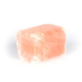 Piece of himalayan salt isolated on white.