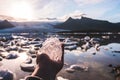 Piece of holding in hand in the Glacier lagoon, Iceland Jokulsarlon, iceberg Royalty Free Stock Photo
