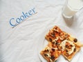 a piece of homemade pizza on a plate, a glass of milk on a white background Royalty Free Stock Photo