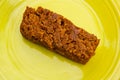 Piece of homemade pumpkin bread on green plate Royalty Free Stock Photo