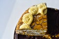 A piece of honey cream dark cake close up