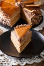 Piece of Hungarian Dobos cake with caramel close-up. vertical Royalty Free Stock Photo