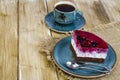 Piece of jelly mousse cake with fruit, cup of tea Royalty Free Stock Photo