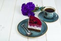 Piece of jelly mousse cake with fruit, cup of tea Royalty Free Stock Photo