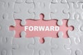 Piece of jigsaw puzzle and word forward Royalty Free Stock Photo