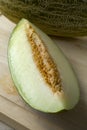 Piece of juicy Piel de sapo melon close up Royalty Free Stock Photo