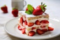 Piece of layered strawberry and cream biscuits shortcake