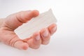 Piece of lined paper in hand Royalty Free Stock Photo