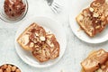 A piece of marble biscuit with chocolate cream and nuts Royalty Free Stock Photo