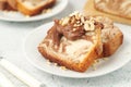 A piece of marble biscuit with chocolate cream and nuts Royalty Free Stock Photo