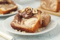 A piece of marble biscuit with chocolate cream and nuts Royalty Free Stock Photo