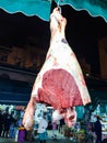 Piece of meat with balls in front of restaurant in Moulay Idriss Zerhoun in Morocco ready for cooking