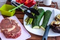 Piece of meat and vegetables preparing barbecue