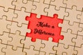 Piece missing from jigsaw puzzle with word Make a Difference