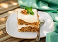 A Piece of Moist Zucchini and Walnut Cake with Cream Cheese Frosting Royalty Free Stock Photo