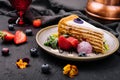 piece of multi-layered cake decorated with mixed berries Royalty Free Stock Photo