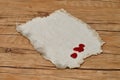 A piece of old paper with drops of blood