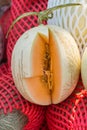 Piece of orange cantaloupe cutted for test taste Royalty Free Stock Photo