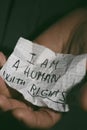 Piece of paper that reads I am a human with rights Royalty Free Stock Photo