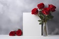 a piece of paper and red roses on a gray background, an isolated background,