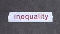 A piece of paper that says inequality.
