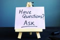 Piece of paper with sign Have questions Ask Royalty Free Stock Photo