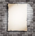 Piece of paper on white brick wall Royalty Free Stock Photo