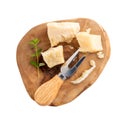 Piece of parmesan cheese on wooden board isolated on white. Parmigiano Reggiano, hard mature cheese. Top view