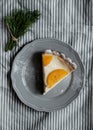 Piece of pie with persimmon on a plate Royalty Free Stock Photo