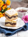 Piece of Poppy Seed Cake on the White Plate