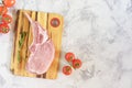Piece Raw Meat on Cutting Board with Rosemary