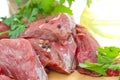 Piece of raw meat with vegetables and spices Royalty Free Stock Photo