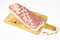 Piece of raw pork belly, fresh meat for cooking. Studio Photo Royalty Free Stock Photo