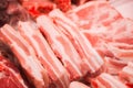 A piece of raw pork closeup. Sale of meat. Butcher shop. Pork in