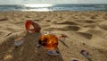 A piece of raw sparkling Baltic amber and seashells large and small on the sea