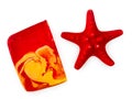 Piece of red handmade soap and red sea star isolated on a white background top view Royalty Free Stock Photo
