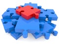 A piece of red puzzle at the top above the pieces of blue puzzle Royalty Free Stock Photo