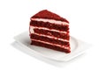 A piece of red velvete cake on isolated white background Royalty Free Stock Photo