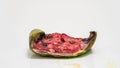 Piece of ripe watermelon rots on white background, time lapse, educational cognitive video